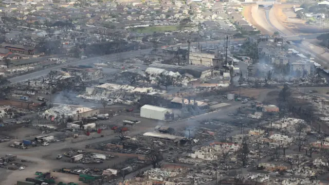 Views from the air of the community of Lahaina after wildfires driven by high winds burned across most of the town several days ago, in Lahaina.