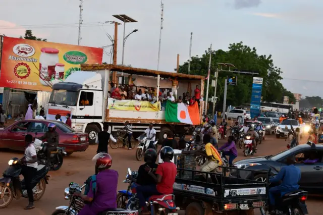 Supporters of Niger's National Council for the Safeguard of the Homeland (CNSP) demonstrate in Niamey on August 10, 2023.