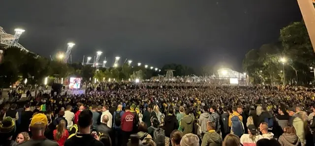 fans outside Stadium Australia