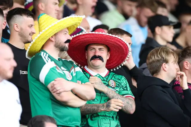 Two Dundee fans dressed in Mexican attire