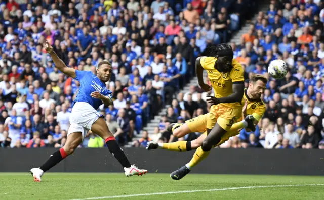 Cyriel Dessers has a shot for Rangers deflected over