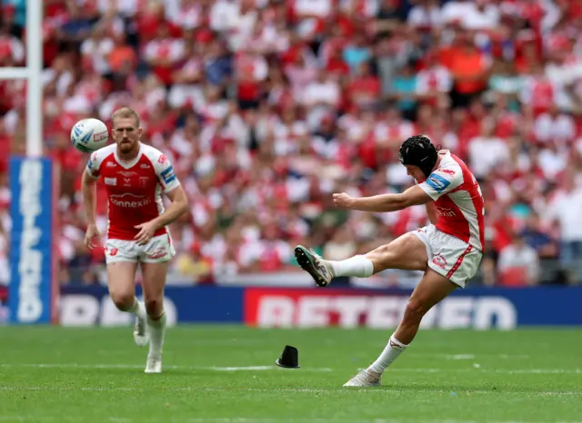 Brad Schneider kicks a penalty for Hull KR