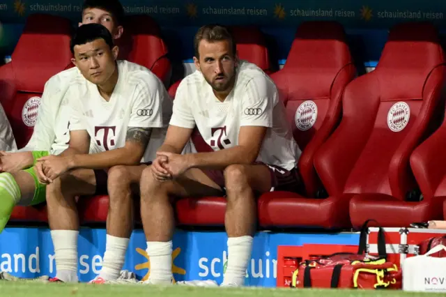 Kane and Kim sit on the bench ahead of the competitive debuts.