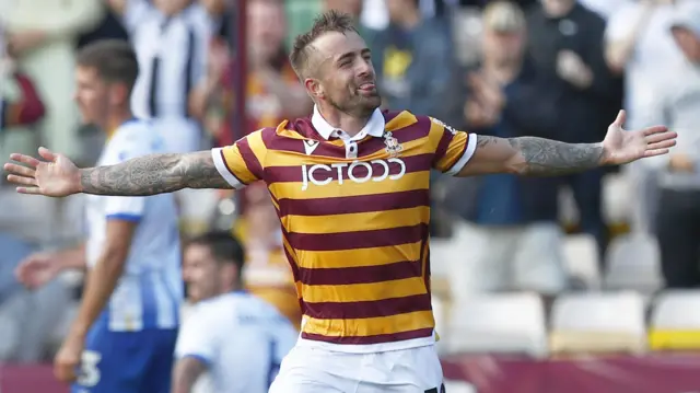 Alex Pattison celebrates a goal for Bradford City