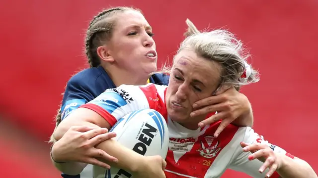 Catilin Beevers tackles Jodie Cunningham