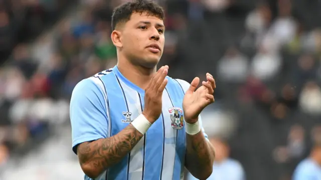 Gustavo Hamer applauds supporters after a Coventry City game