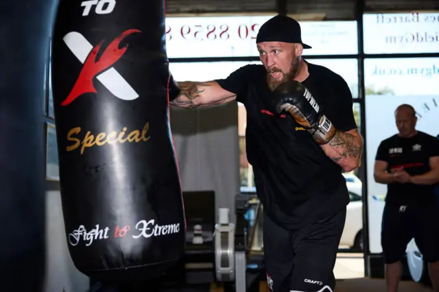 Robert Helenius throws a punch at a bag