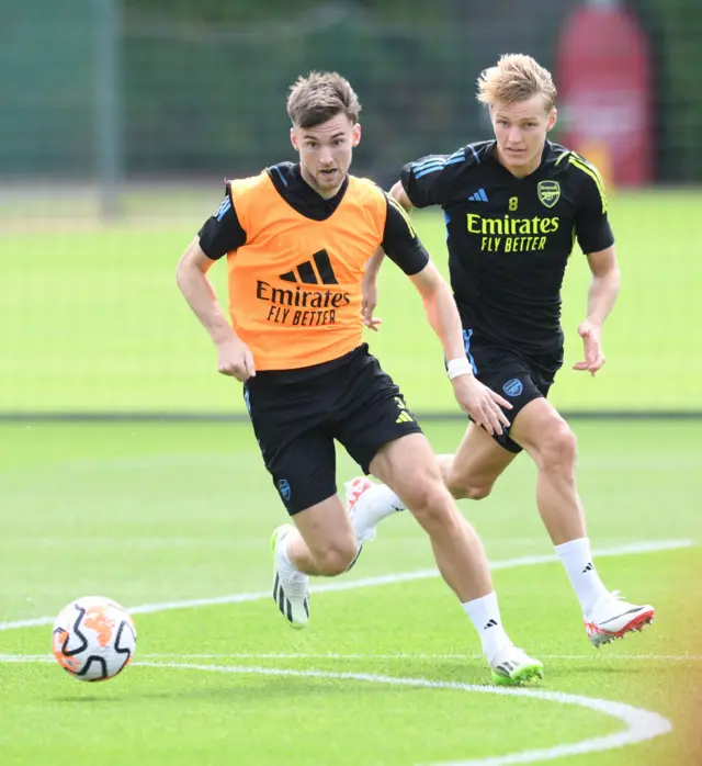 Kiera Tierney dribbles away from Odegaard in training.