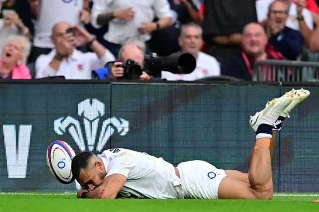 Joe Marchant knocks it on in a diving attempt catch