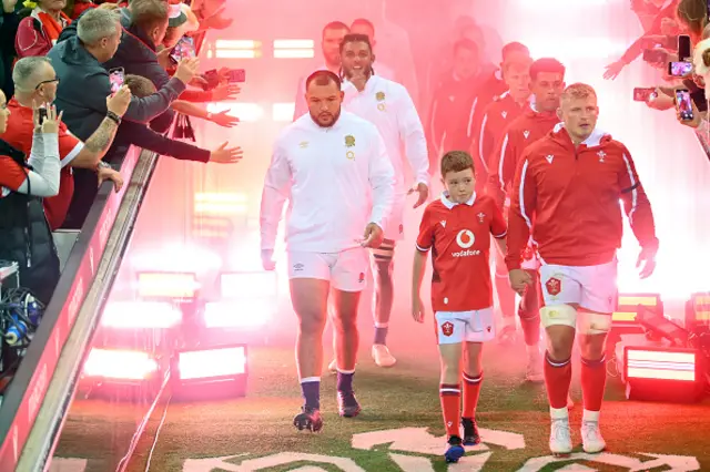 England and Wales teams walk onto the pitch at the Principality Stadium