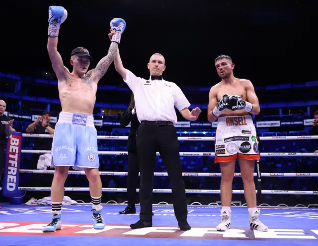 Campbell Hatton has his arm raised by the referee after beating Tom Ansell