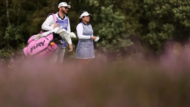 Lilia Vu eyes up a shot from the fairway