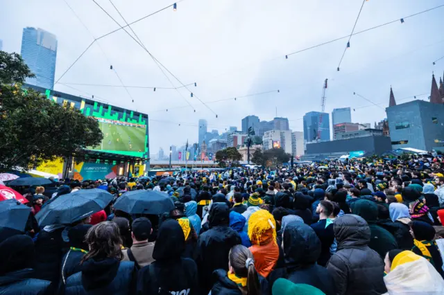 Thousands of fans gather in a fan park in Melbourne to watch the Matildas.