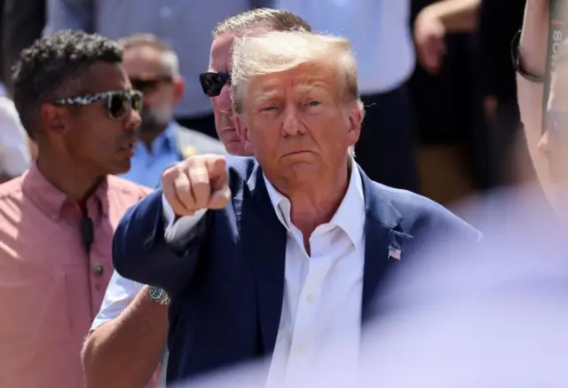 Republican presidential candidate and former U.S. President Donald Trump campaigns at the Iowa State Fair in Des Moines, Iowa, U.S. August 12, 2023