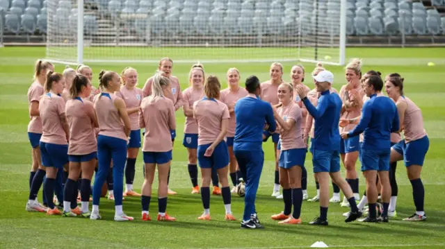 England players warm-up