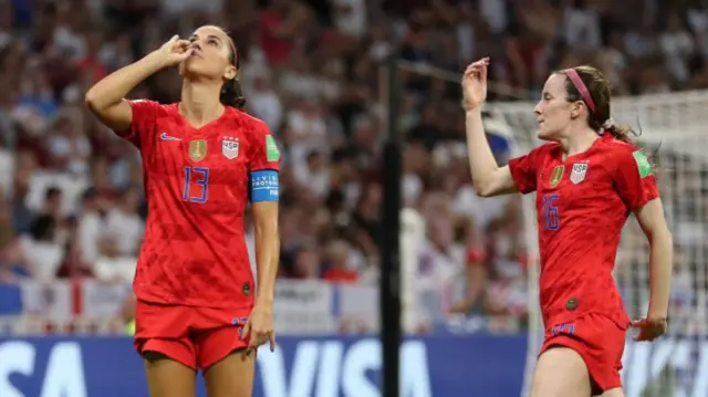 Alex Morgan celebrates with her 'Tea' celebration against England