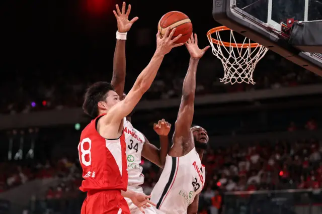 Yudai Baba #18 of Japan drives to the basket during the international basketball game between Japan and Angola at Ariake Arena on August 15, 2023 in Tokyo, Japan.