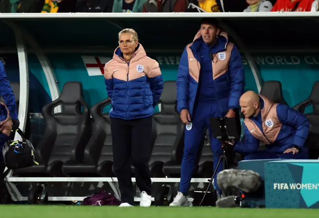 Sarina Wiegman watches on from the dugout.