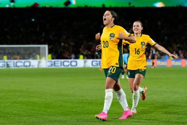 Sam Kerr celebrates her goal.