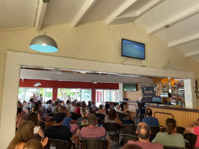 People watching Australia v England in a bar in France