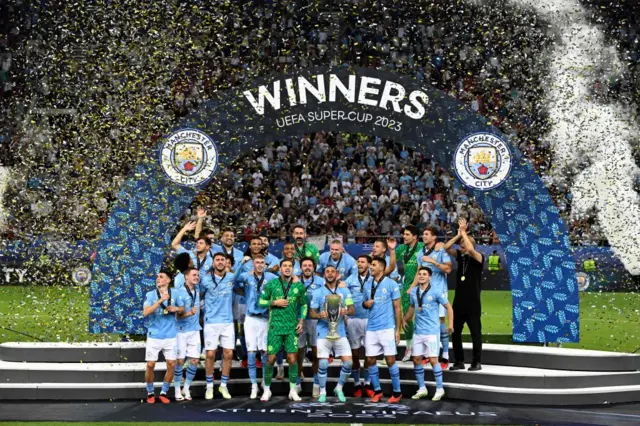 Manchester City hold up the Uefa Super Cup