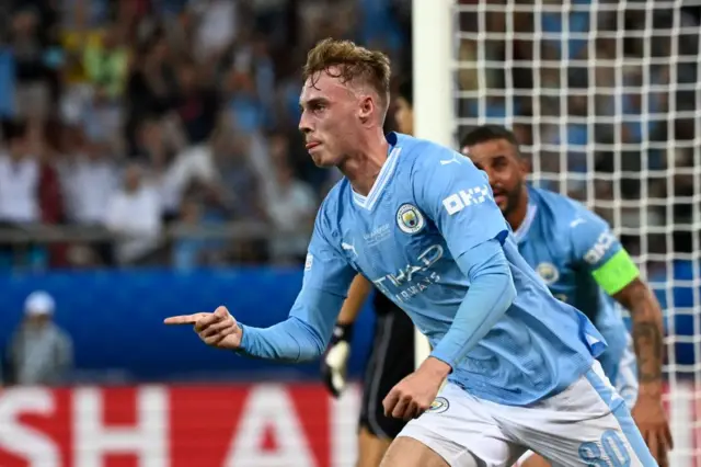 Cole Palmer celebrates for Man City