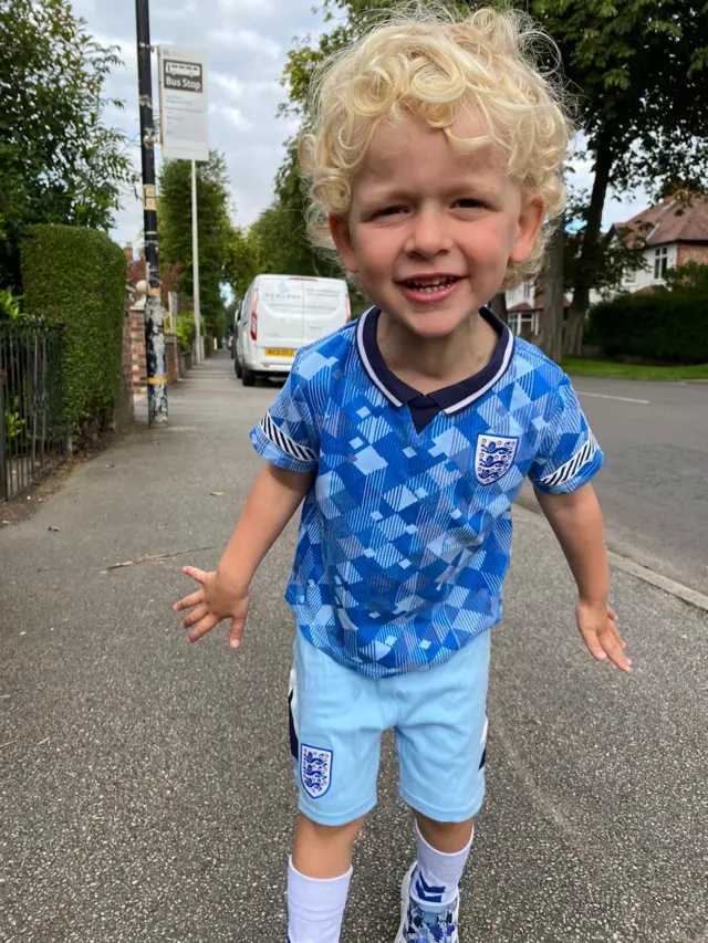 Toddler in England kit