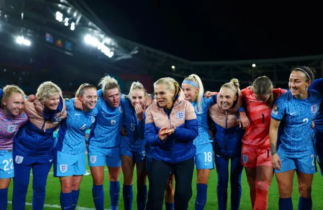 Sarina Wiegman addresses the England squad after their win.