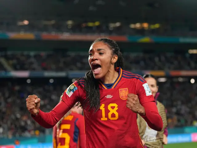 Salma Paralluelo celebrates scoring by pumping her fists.