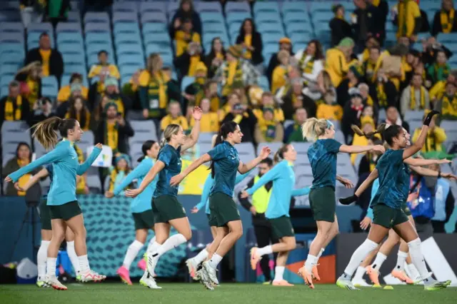 Matildas warm up.