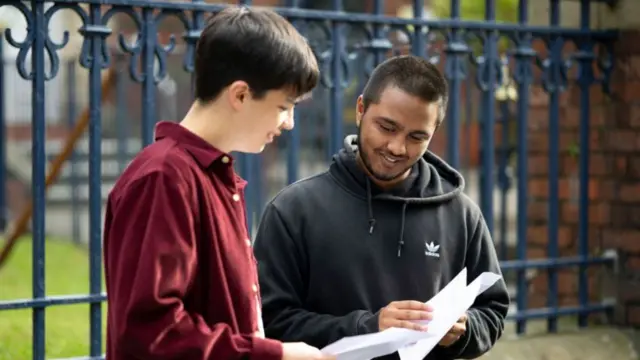 Two students check their results