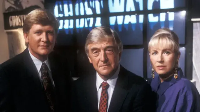 Mike Smike, Michael Parkinson, Sarah Greene with "Ghostwatch" on the screens behind them