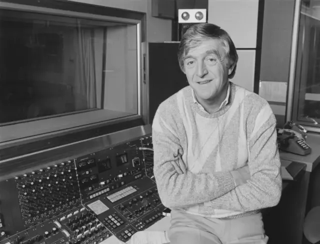 Sir Michael Parkinson, sitting in the radio studio after being announced as the new presenter of Desert Island Discs in  1985