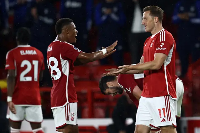 Chris Wood celebrates with Nottingham Forest's Brazilian midfielder Danilo