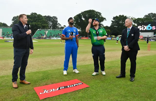 Team captains Paul Stirling of Ireland (right) and Jasprit Bumrah of India during the coin toss