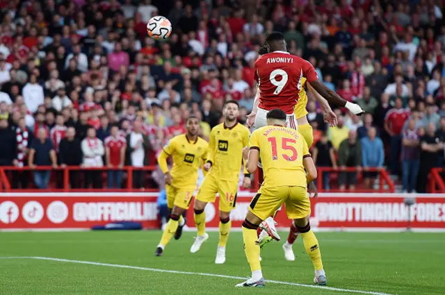 Taiwo Awoniyi scores a header