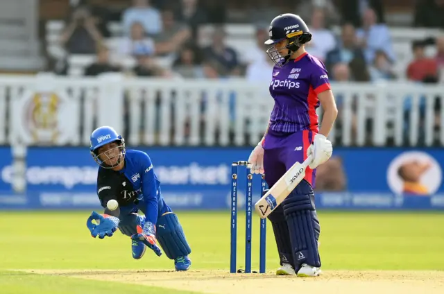 Alice Davidson-Richards is caught by Richa Ghosh