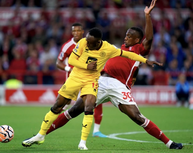 Willy Boly goes in for a tackle