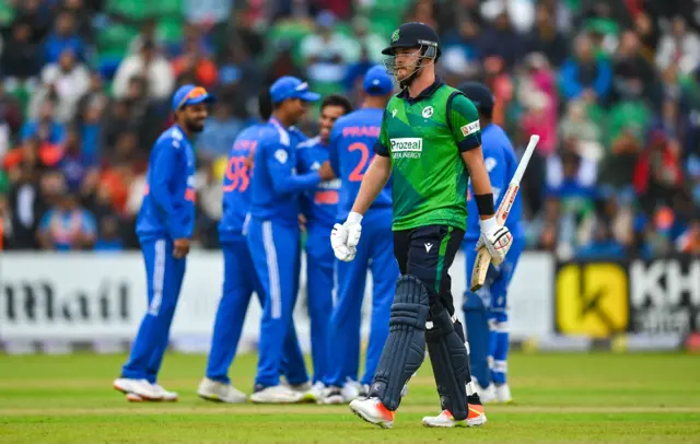 Ireland batter Mark Adair after being dismissed by India bowler Ravi Bishnoi