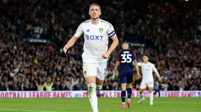 Luke Ayling celebrates his goal for Leeds against West Brom