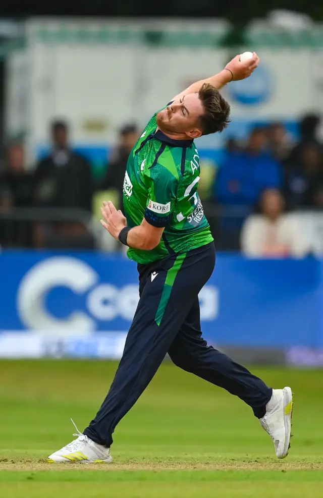 Ireland bowler Mark Adair bowling against India