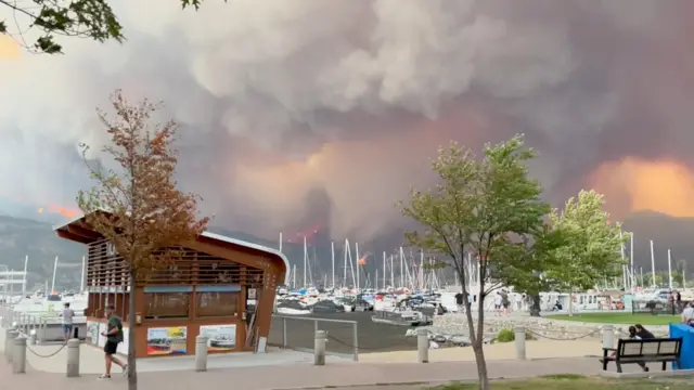 Smoke rises during the wildfire in Kelowna, British Columbia, Canada August 17, 2023