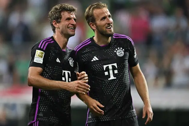 Thomas Muller and Harry Kane together on the pitch after the game