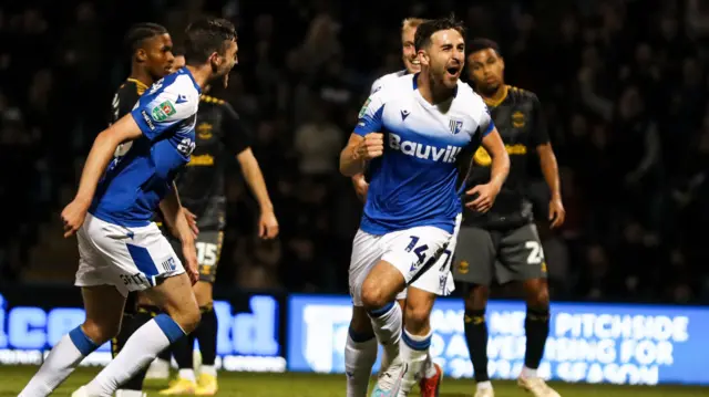 Gillingham's Robbie McKenzie celebrates a goal