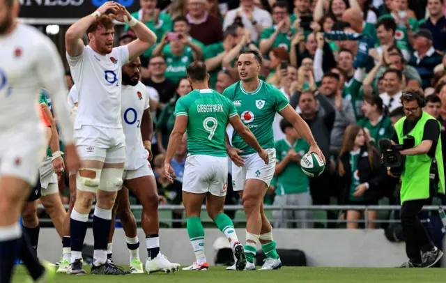 James Lowe celebrates scoring a try