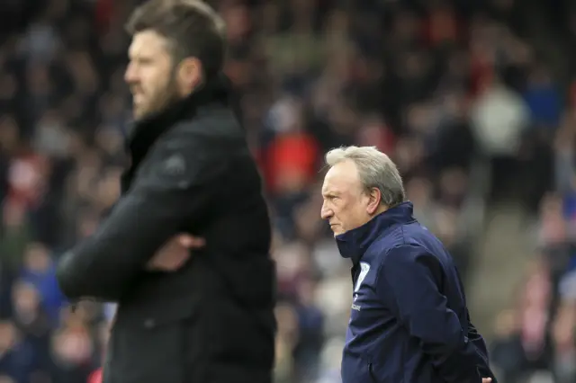 Neil Warnock and Michael Carrick on the touchline for Huddersfield and Middlesbrough