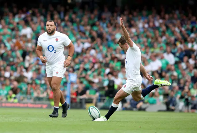 England's fly-half George Ford kicks a penalty against Ireland