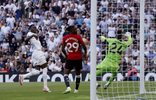 Pape Sarr volleys home to give Spurs the lead.