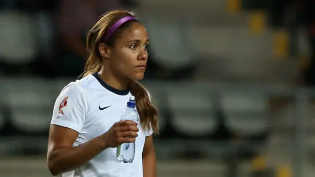 Alex Scott looks dejected