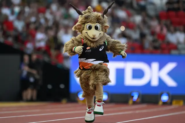 Youhuu, the mascot of the Budapest 2023 World Athletics Championships, runs on the track during the opening ceremony